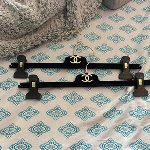 CHANEL Black and Gold Clip Hangers
